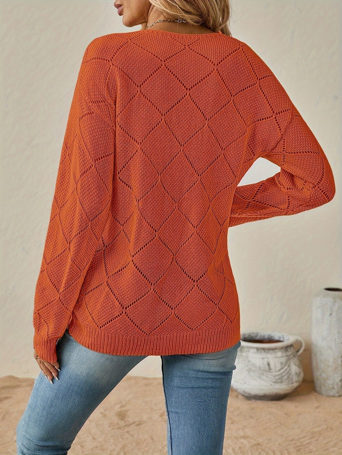 Elegant openwork v-neck sweater