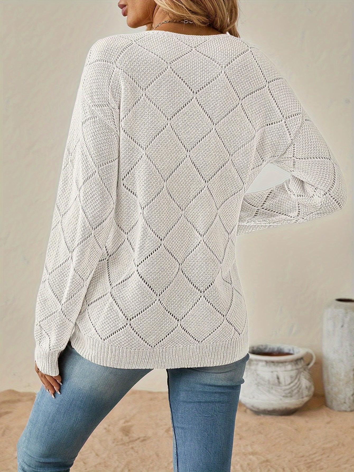 Elegant openwork v-neck sweater