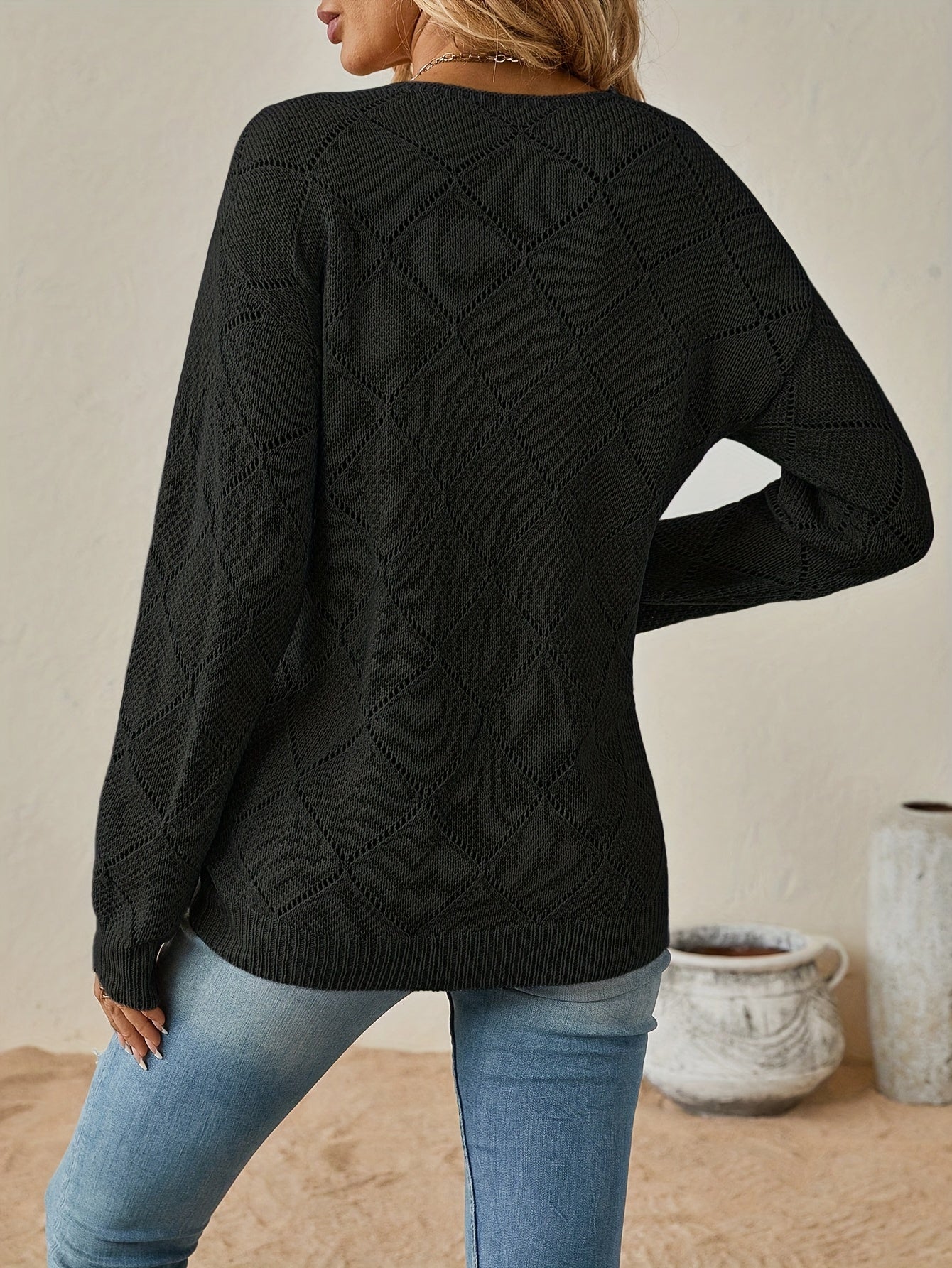 Elegant openwork v-neck sweater